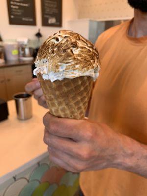 Coradomum pistachio mixed with verve coffee topped with marshmallow fluff on a yummy cone