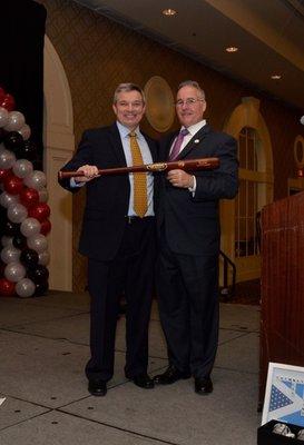 Presenting a custom engraved Louisville Slugger to Chuck Hall the new President of the Chimney Safety Institute of America.