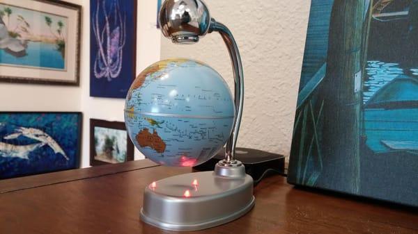 This globe literally levitates in place!  Come by and check it out for yourself!