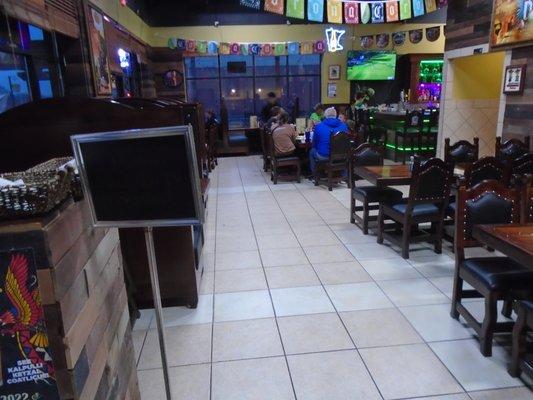 View looking into the main dining room from the front entryway.