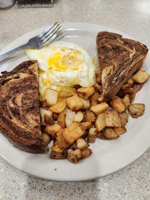 Eggs potatoes and rye toast