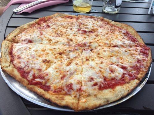 Cheese pizza on the patio