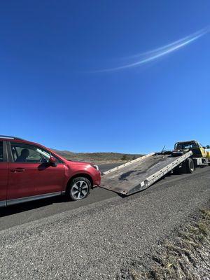 My car being towed, flat fire