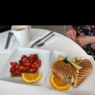 Strawberry and Nutella crepe and a vegan breakfast panini.