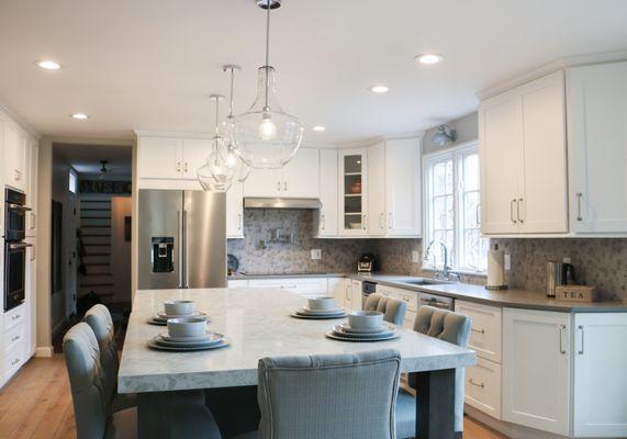 Pelican White Quartz Countertop Installation with Fossil Gray Backsplash