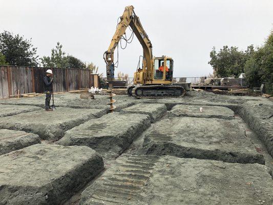 Pier installation on oceanfront bluff foundation