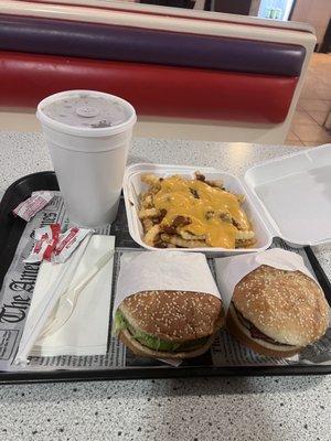 Texas Burger, Avocado Burger, chili cheese fries, and a coke.