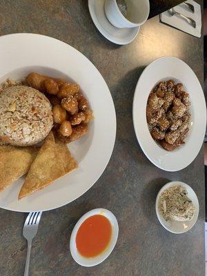 Sweet and sour chicken lunch special with pork fried rice and crab Rangoons, and sesame chicken with chicken fried rice.