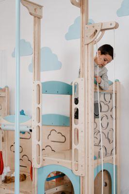 Child exploring indoor play area