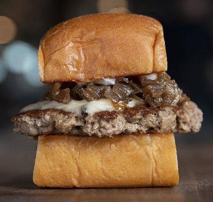 Impossible Slider: Impossible patty, mayo, white American cheese, caramelized onions, served on King's Hawaiian roll