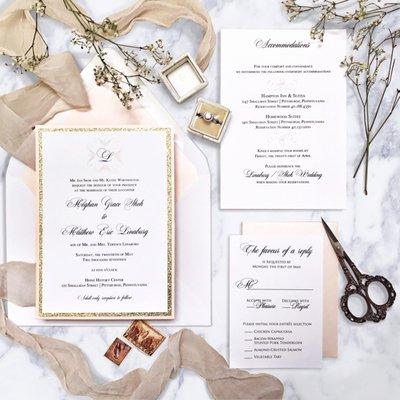 Blush, gold and ivory pocket wedding invitation suite for a wedding at the Henz History Center in Pittsburgh, Pennsylvania.