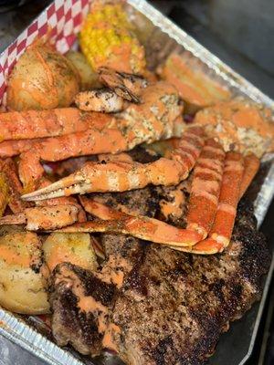 Surf & Turf ( Snow Crab Legs & Sirloin Ribeye with Shrimp, Corn & Potatoes)