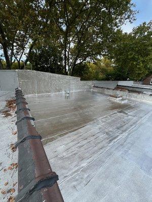 New roof installed and fresh coat of aluminum roof coating