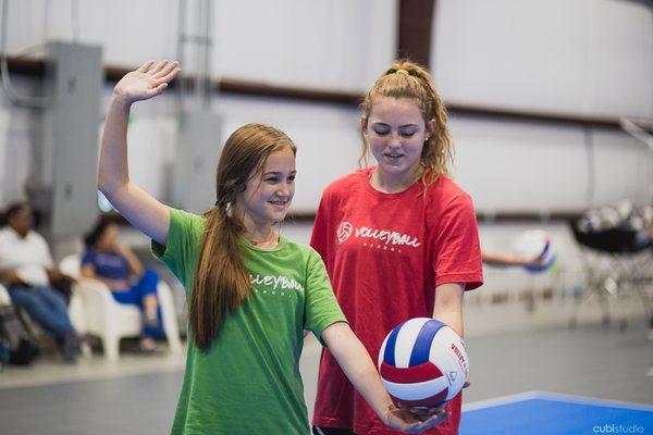 The Volleyball School - Coach working with student