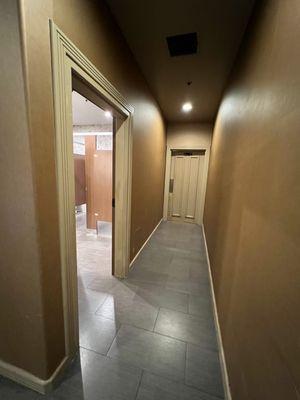 Hallway to bathrooms