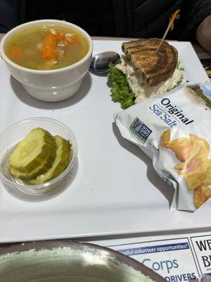 Half chicken sandwich and chicken noodle soup