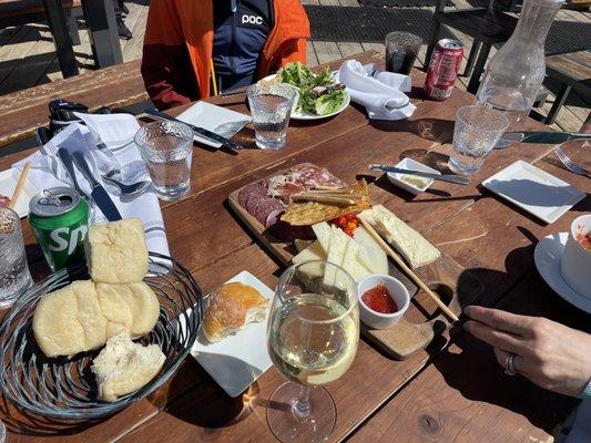 Bread, wine, charcuterie, spring salad