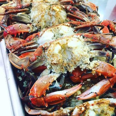 Local Blue Claw Crabs cleaned and seasoned with homemade old bay and minced garlic