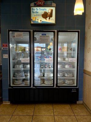 Inside: freezer with ice cream cakes and prepackaged frozen treats