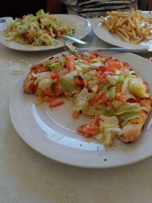 Cheeseburger pizza,  different for certain. And very yummy ...