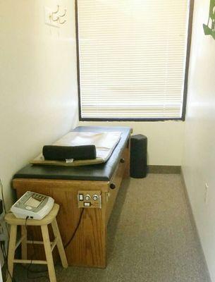 One of our roller table and muscle stim therapy rooms, to help you gently stretch, relax muscles, & increase circulation.