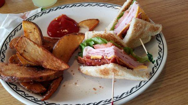 Hot Cakes club sandwich with homemade steak fries!