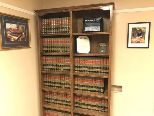 The Gorski Firm, APC's bookshelf in the conference room.