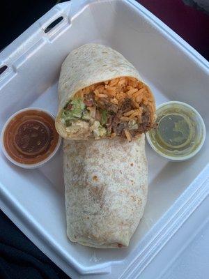 Mega carne asada burrito with salsa on the side