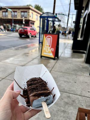 Cookie monster, dipped in milk chocolate w/ oreo crumbs