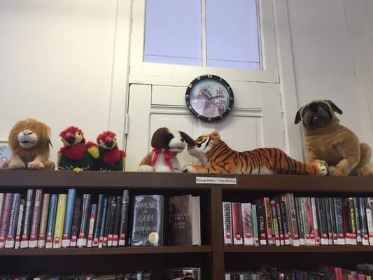 A train clock because the train runs behind this library