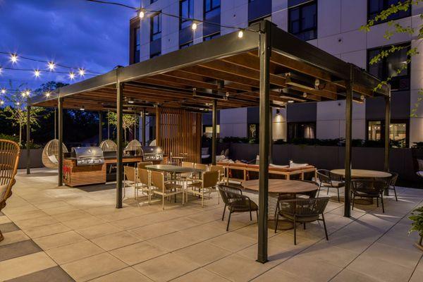 The outdoor terrace brightly lit in the evening