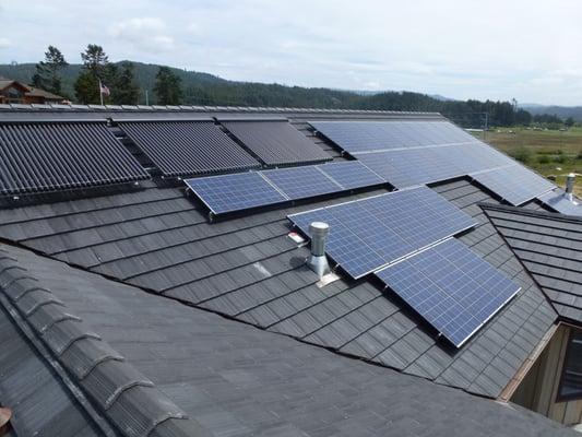 10 kW solar electric system and 3 evacuated tube collector solar thermal system overlooking Humboldt Bay.