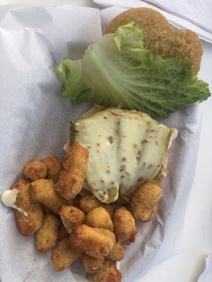 Ole' green chili grilled chicken burger with jalapeño cheese curds.  Yum!