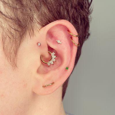 Ear curated by our piercer Heather.