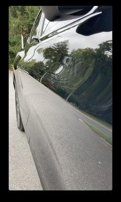 Mirror-like surface of the car after polishing and ceramic coating