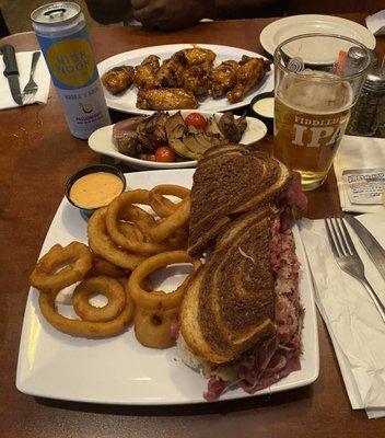 Ruben w/ Onion Rings, grilled vegetables, chicken wings