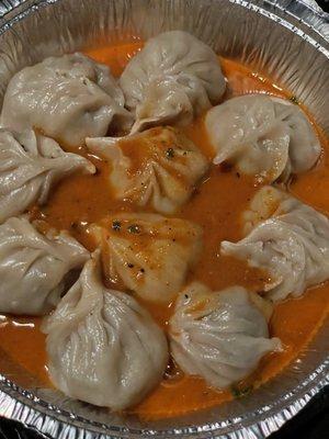 Dumplings with the sauce poured on