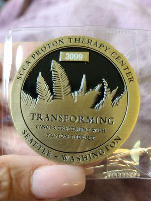 My husband was patient 3099 to receive this coin to signify the completion of his proton therapy.