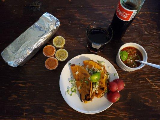 Queso birria tacos, consome (1/3 of it) and my son's California burrito de pollo. It weighs as much as a small baby.