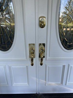 Design actual and dummy handles installed. Deadbolt replaced with Schlage keypad lock.