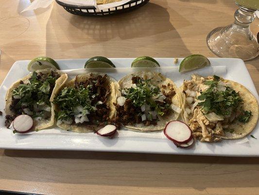 Carnitas, al pastor, carne asada, chicken Mexican street tacos