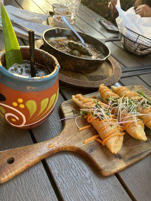 Empanadas del Mar, Piña Paloma, and Queso Fundido with Chorizo