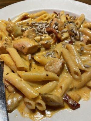 Sunflower Chicken Pasta Chicken sauteed w/artichokes, sun-dried tomatoes, mushrooms, and sunflower seeds, in a light cheese and wine sauce