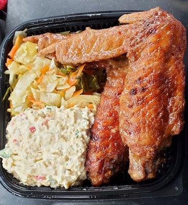 Honey BBQ Turkey Wings, with stewed cabbage, and potato salad. Nice tasty, meaty wings. The potato salad is spicy and delicious.