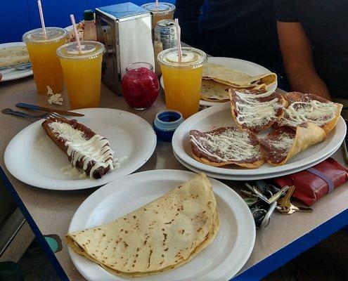 Baleada sencilla, catrachas, stuffed plantain, passion fruit water - all delicious