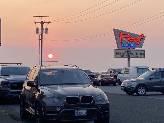 Parking lot at sunset. There's wildfires going on outside the area which is making it a little smoky. Usually it's pretty crystal clear.