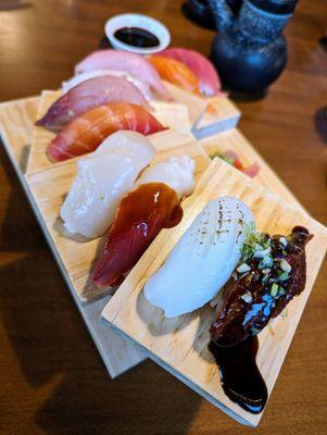 Nigiri. 10 pieces for $32. Eel, Squid, Surf Clam (special), Scallop, Beet Salmon, Yellowtail, Amberjack, Red Snapper, Tuna, Salmon.