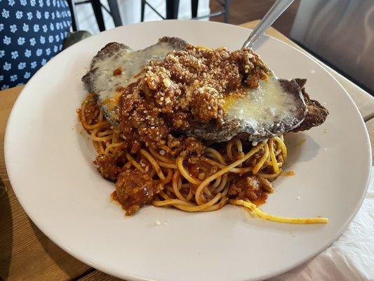 Veal Parmesan with bolognese sauce