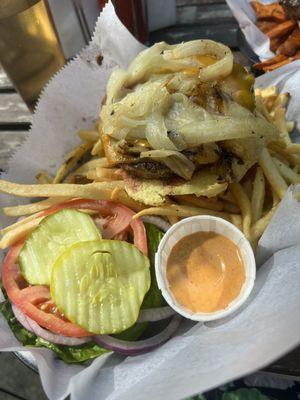 Hamburger with cheddar cheese and caramelized onions