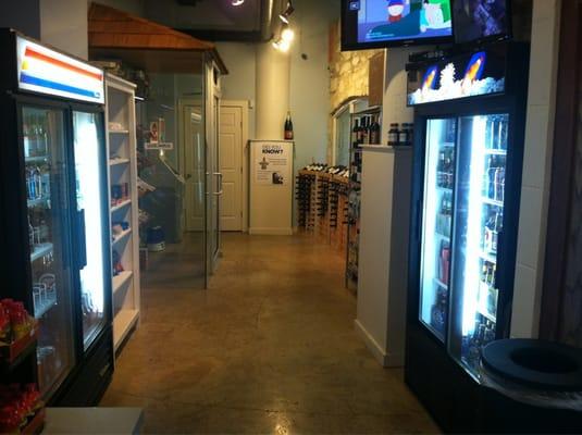 Beer/wine refrigerators, wine racks, snack shelves, cigar humidor, ATM.